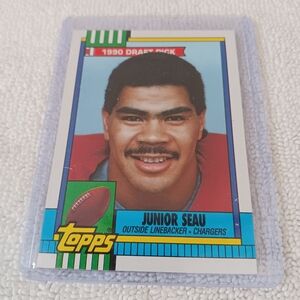 Topps Junior Seau Football Card with Red and Black Accents
